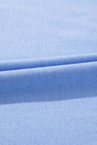 Close-up of soft sky blue fabric, showcasing the luxurious texture for the Dreamfield Days Maxi Dress.