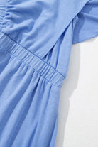 Elegant sky blue fabric of the Dreamfield Days Maxi Dress highlighting its soft texture and gathered waist.