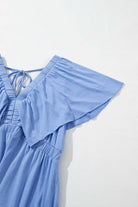 Soft sky blue maxi dress featuring flutter sleeves and a V-neckline, perfect for summer outings.