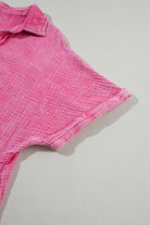 Close-up of the neckline and sleeve of the Sweetwater Serenade pink mineral-wash dress, showcasing its crinkle texture.