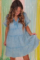 Sky Blue Sweetwater Serenade dress featuring a tiered silhouette and split neckline, ideal for warm-weather style.
