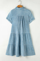 Sky blue mineral-wash dress with tiered silhouette and split neckline, perfect for warm weather.
