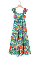 Vibrant green floral maxi dress with ruffled shoulder straps and tiered design, perfect for sunny days.