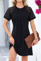 Chic black shift dress with lace sleeves and pleated neckline for stylish all-day wear.