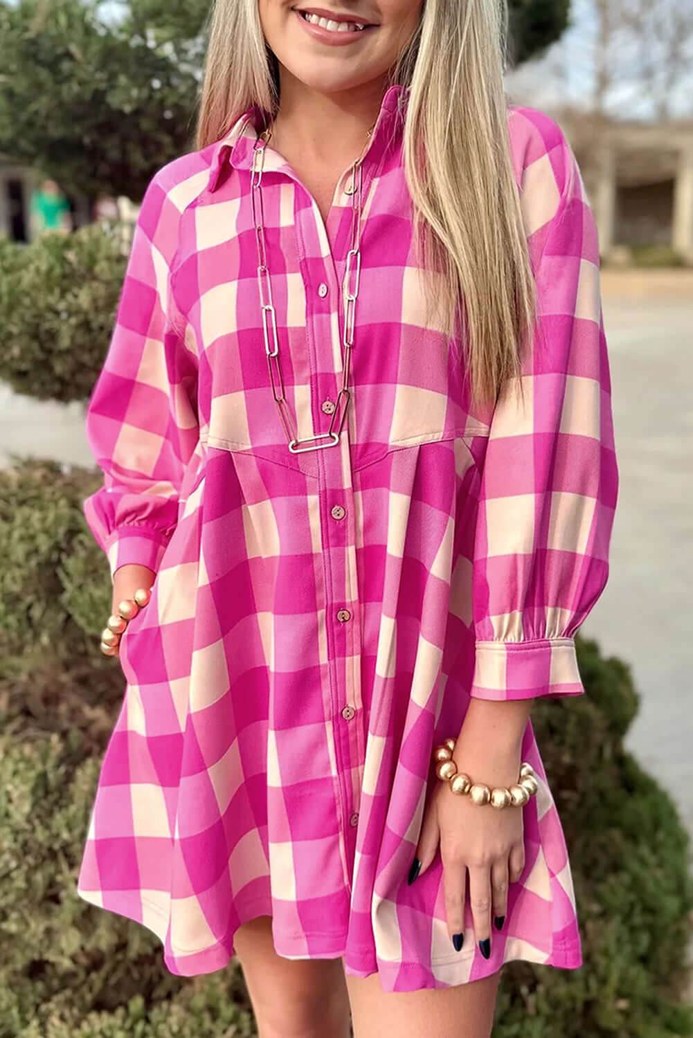 Stylish Check Her Out Dress in pink and cream plaid, featuring collared neck and bracelet sleeves for a chic look.