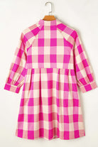 Stylish Check Her Out Dress featuring pink and white check pattern with collar and bracelet sleeves.