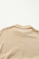 Desert Tan mini dress fabric close-up with elegant shirt collar.