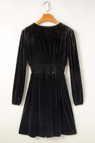 Black velvet SABLE SIREN Dress with surplice neckline, long sleeves, and high waistline for an elegant silhouette