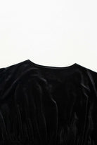 Close-up of SABLE SIREN Dress in premium velvet fabric, showcasing the elegant surplice neckline and luxurious texture.