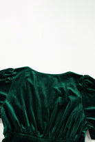 Elegant Emerald velvet dress back view with chic short sleeves and tiered design for a boho-inspired look.