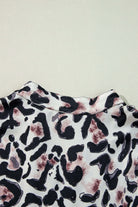 Leopard print fabric detail of Walk on the Wild Side dress showcasing bold patterns and soft texture.