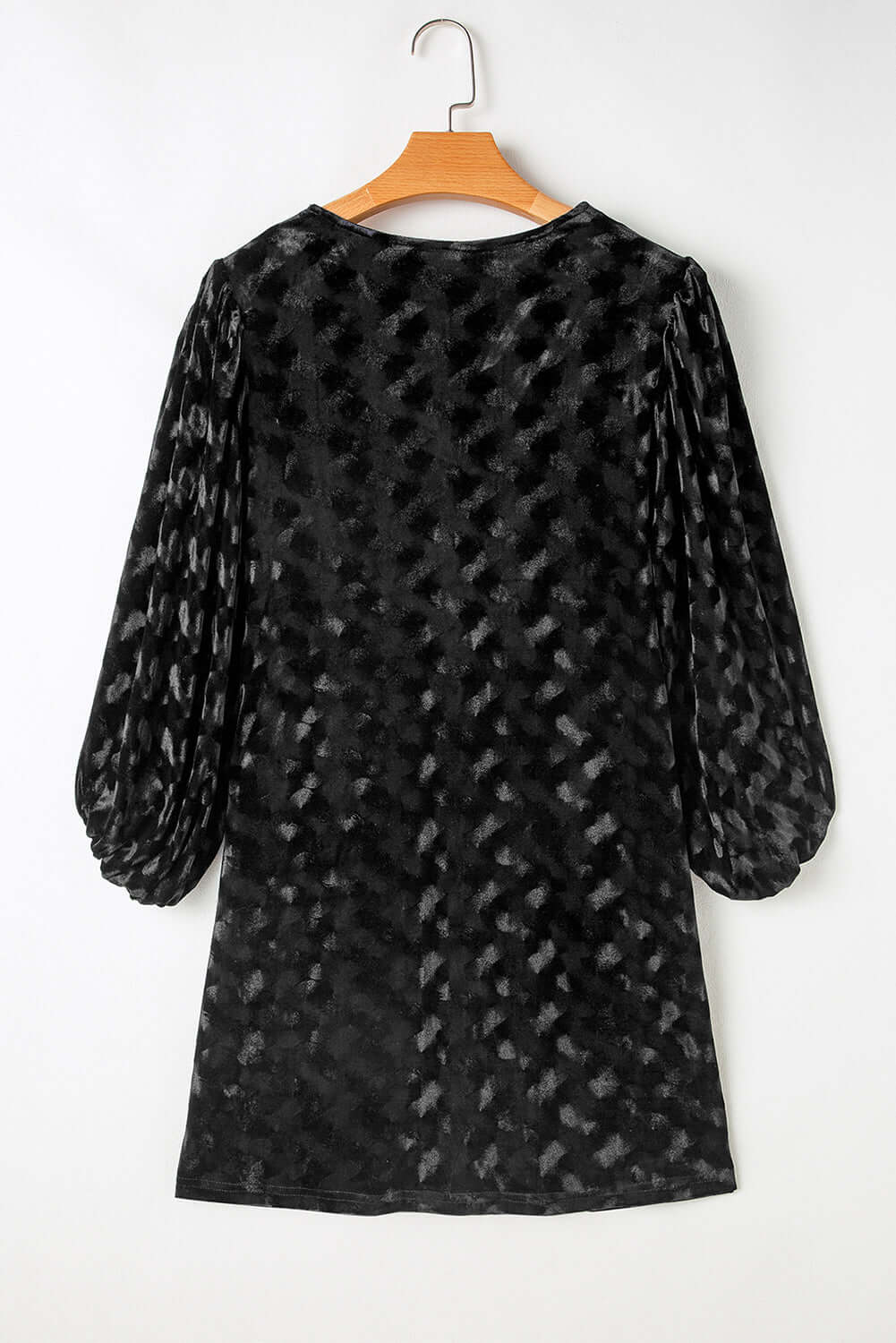 Black Velvet Eclipse Dress with Muted Animal Print and Balloon Sleeves on Hanger