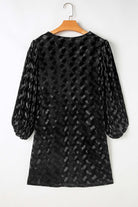 Black Velvet Eclipse Dress with Muted Animal Print and Balloon Sleeves on Hanger