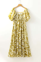 Spring Time Maxi Dress featuring floral print and square neck design, perfect for elegant outdoor occasions.