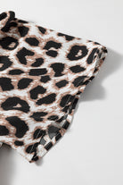 Close-up of fabric featuring leopard print design for the Untamed Beauty Maxi Dress.