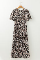 Leopard print maxi dress with flutter sleeves and V-neck, perfect for a bold and elegant look.