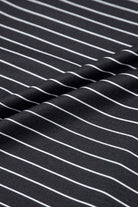 Close-up of black and white striped fabric highlighting the soft texture of the Perfect Pathways Dress.