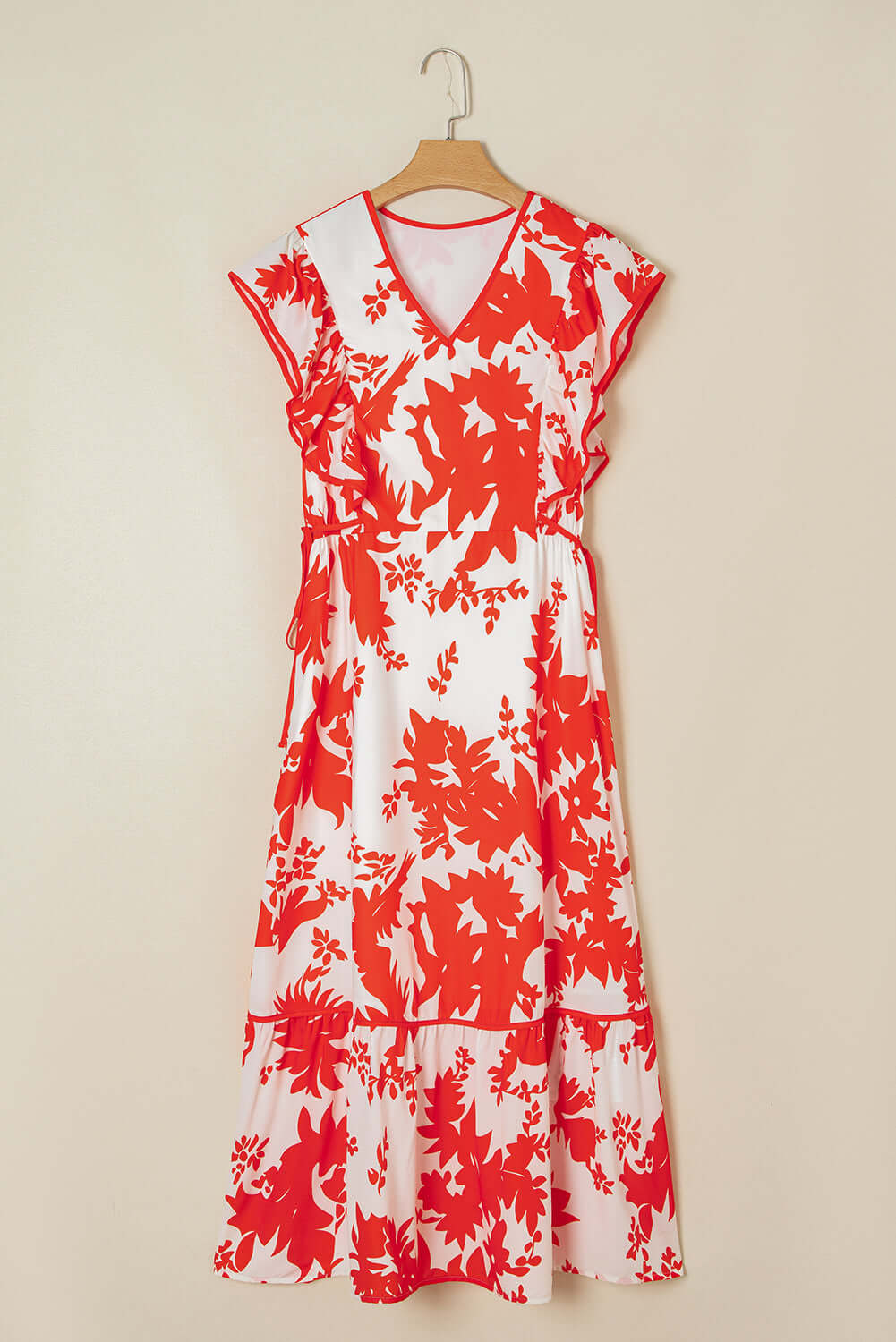 Salsa Garden Dress featuring a red floral print on ivory, with flutter sleeves and a tiered skirt, perfect for summer occasions.