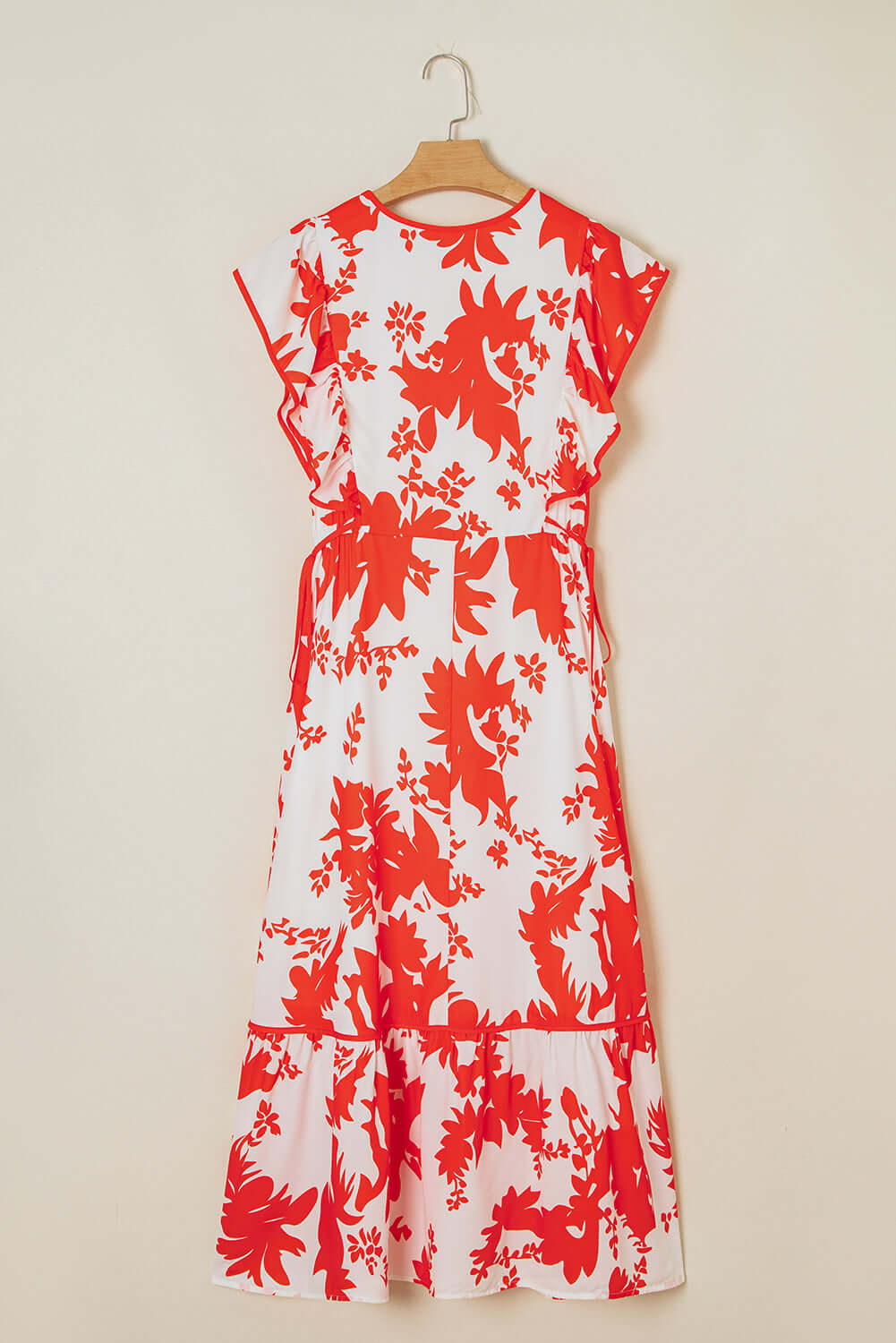 Salsa Garden Dress with red floral print on ivory, featuring flutter sleeves and tiered skirt for a feminine summer look.