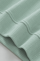 Luxurious minty jade green textured fabric from the FULLY JADED SET, showcasing elegant design and style by [Brand Name].