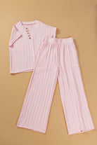 Light pink Soft Serenade Set featuring textured Henley top and wide-leg pants, perfect for a chic and comfy look.