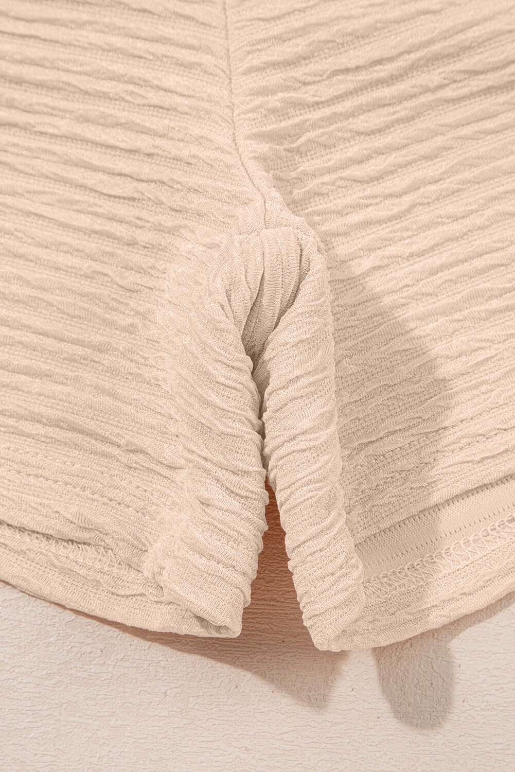 Textured pink shorts from the Champagne Chill two-piece set, featuring an elastic waistband and soft fabric.