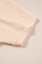 Close-up of textured pink fabric from the CHAMPAGNE CHILL 2 PIECE SET, showcasing soft, cozy material.