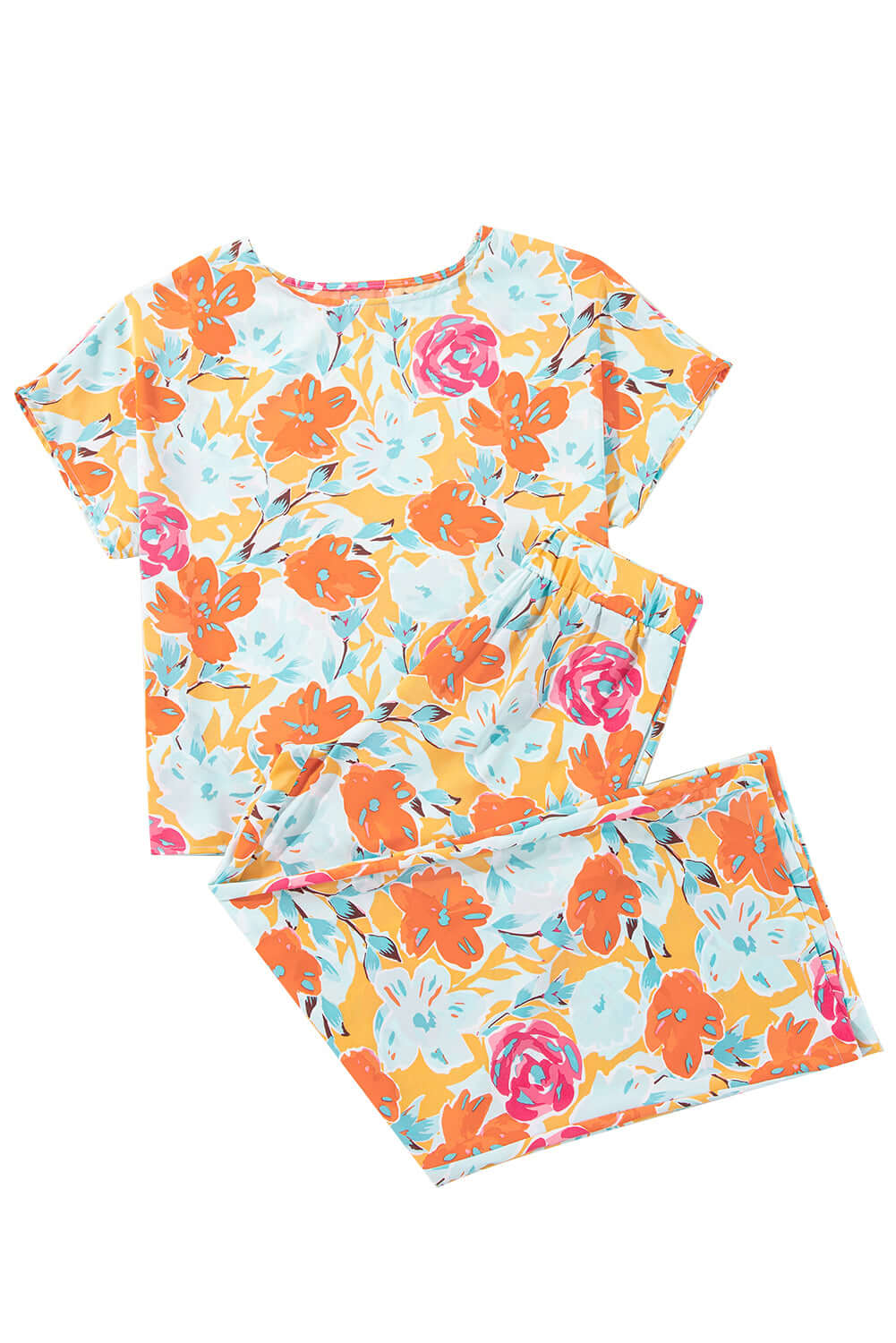 Vibrant floral printed two-piece pants set in tangerine, featuring a relaxed short-sleeve top and wide-leg pants.