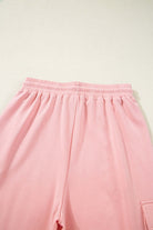 Close-up of pink cargo sweatpants waistband from the Pink Cloud lounge set, showcasing comfort and style.