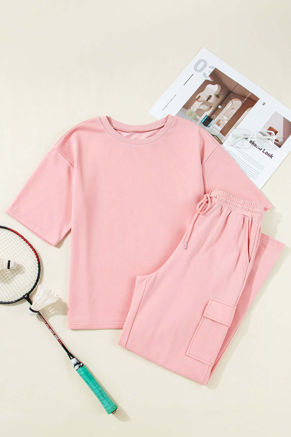 Pink Cloud 2 piece lounge set featuring a half sleeve tee and cargo sweatpants for comfort and style.