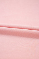 Close-up of soft pink fabric texture for Pink Cloud 2 piece lounge set, highlighting comfort and quality.