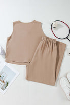 Oasis Moment tan 2-piece pants set featuring a cropped vest and wide-leg pants on a white surface.