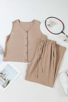 Oasis Moment tan 2-piece pants set featuring a buttoned crop vest and drawstring wide-leg pants laid on a flat surface.