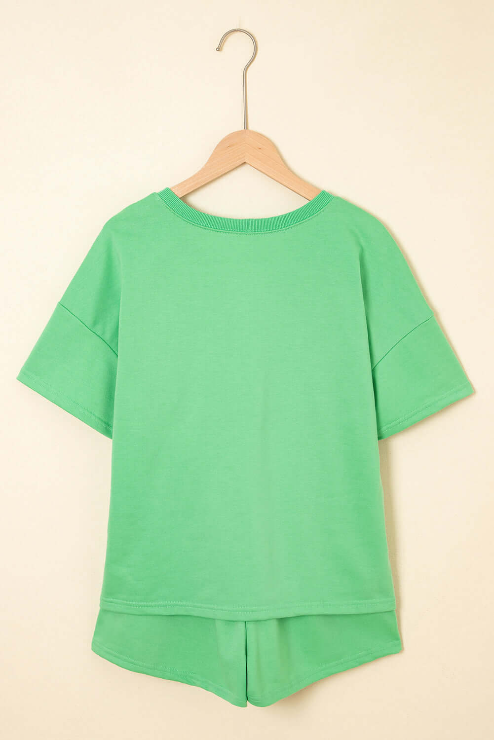 Bright green V-neck drop-shoulder tee from the Zest for Life Shorts Set, showcasing a relaxed fit.