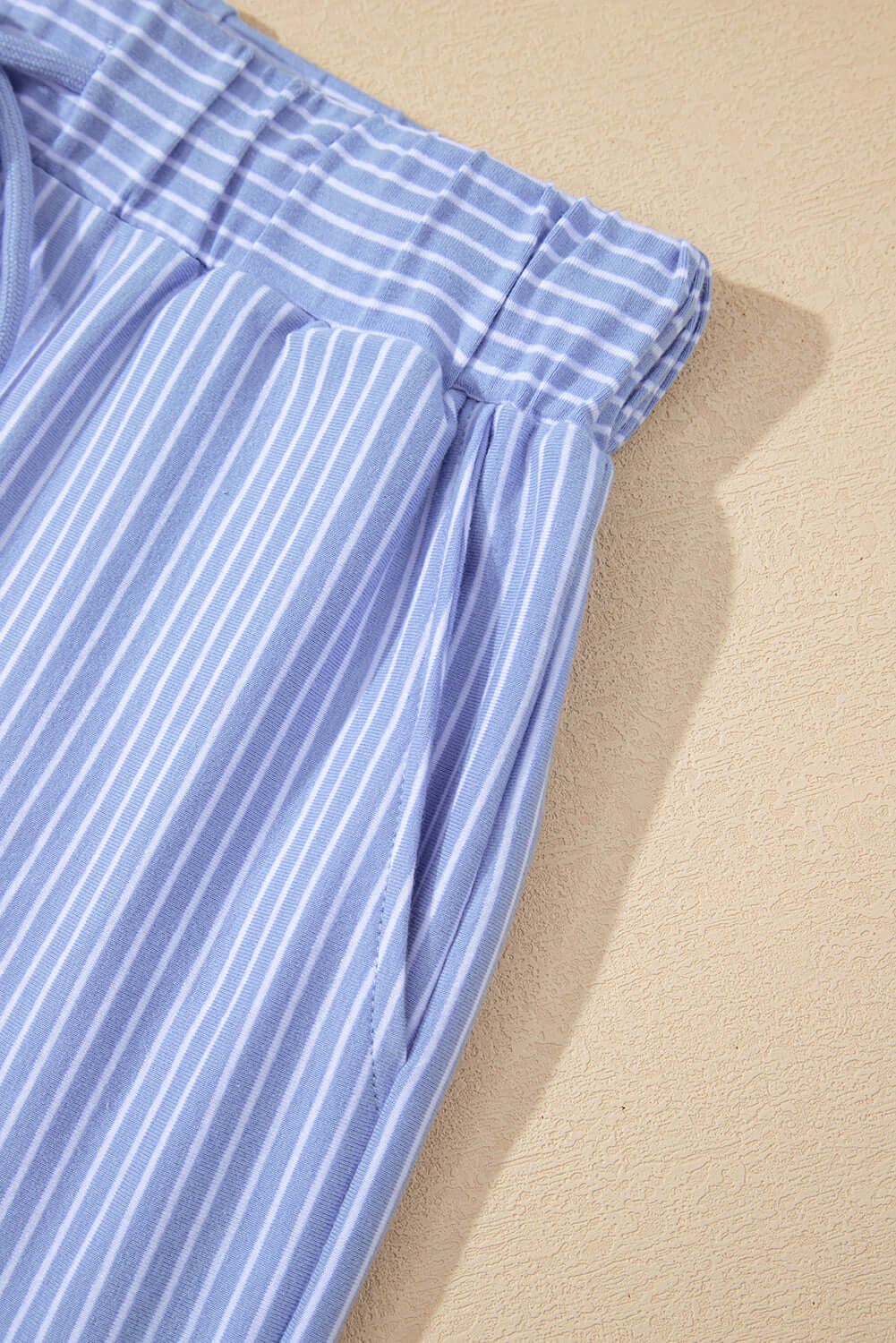 Misty Harbor sky blue stripe shorts set featuring an elastic waistband and stylish vertical stripes for a relaxed fit.