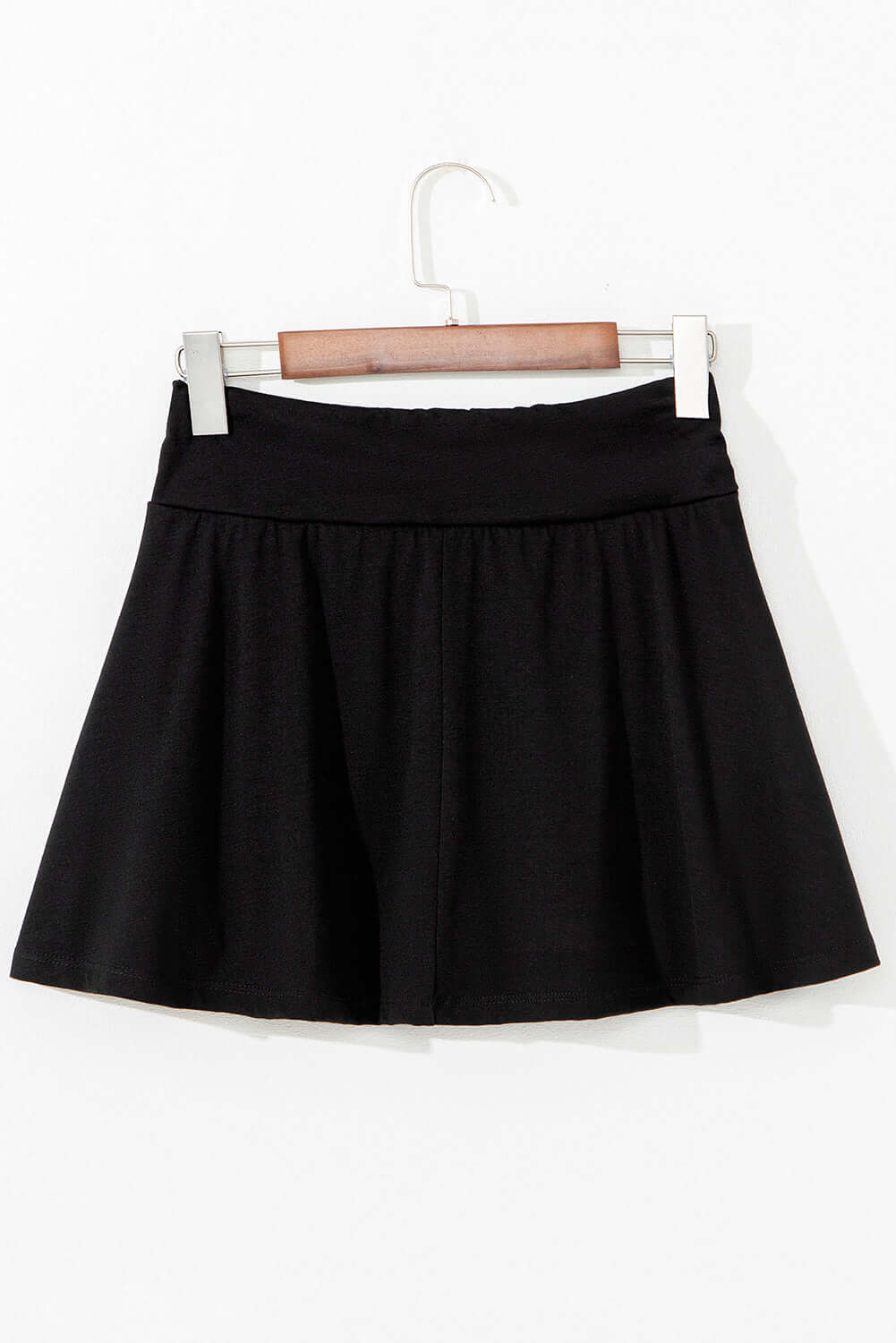 Eclipse Edge Skort featuring a flattering black wide waistband and ruched design for stylish activewear.