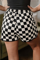 Fast Lane Shorts featuring black and white checkered pattern, perfect for casual and sporty looks.