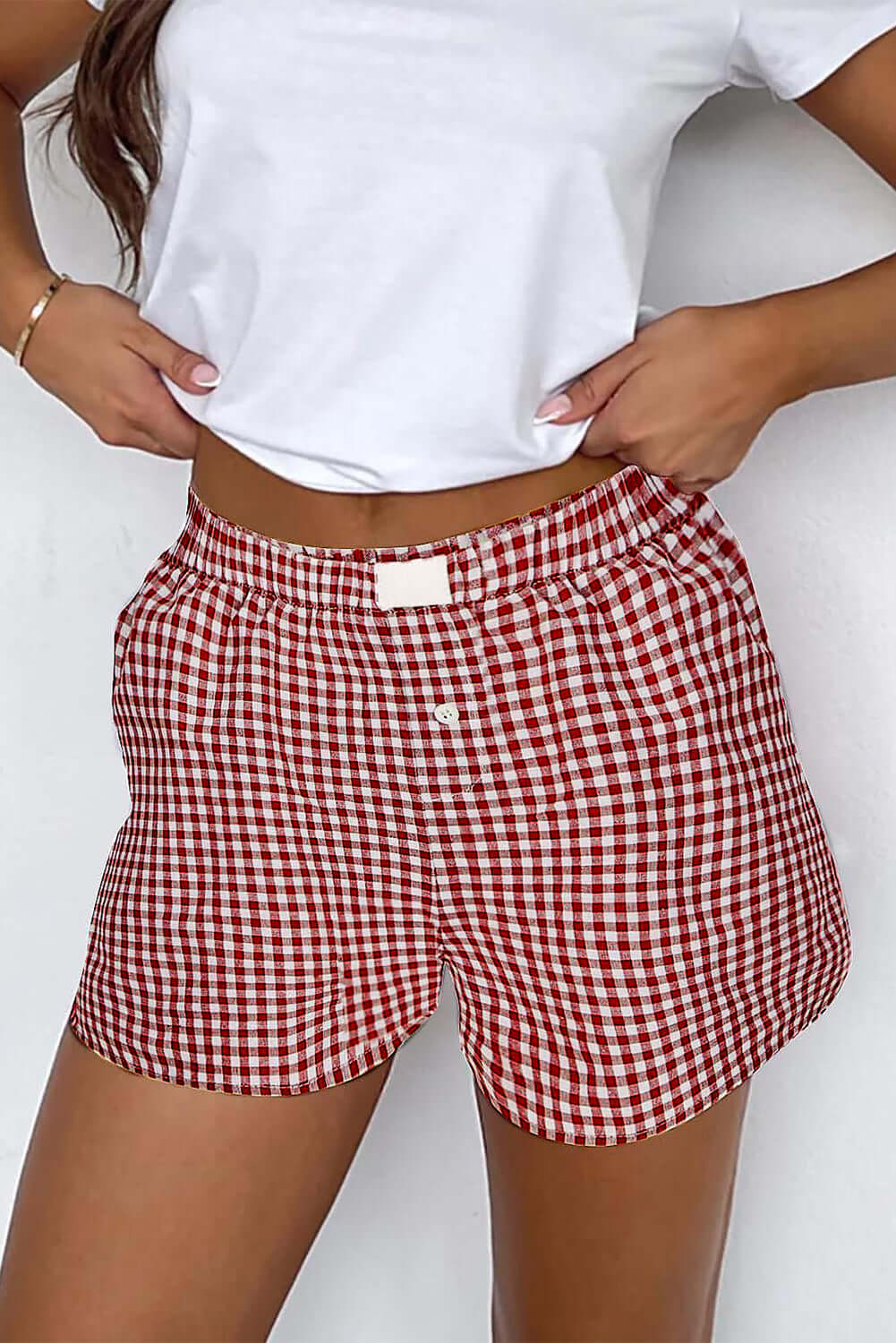 Red gingham high waist shorts with elasticated waistband, perfect for summer picnics and casual outings.