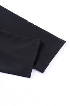 Black leggings fabric detail showcasing high-quality stretch material