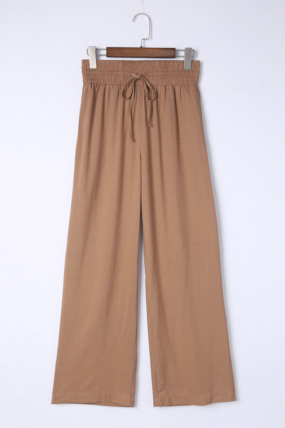 Caramel Latte wide leg pants with smocked waist and side pockets for a chic look