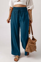 Cute & Comfy COASTAL NIGHTS PANTS - Teal Tiger Boutique by Vivian-Lu $32.00 Discover trendy, teal blue COASTAL NIGHTS PANTS by Teal Tiger Boutique. Enjoy comfort with a pull-on design, smocked waist, and side pockets. Teal Tiger Boutique