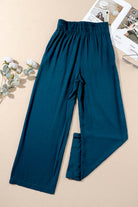 Cute & Comfy COASTAL NIGHTS PANTS - Teal Tiger Boutique by Vivian-Lu $32.00 Discover trendy, teal blue COASTAL NIGHTS PANTS by Teal Tiger Boutique. Enjoy comfort with a pull-on design, smocked waist, and side pockets. Teal Tiger Boutique