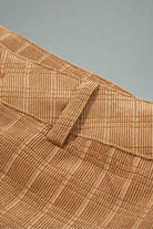 Close-up of checkered corduroy fabric on high waist pants by Vivian-Lu, showcasing stylish design and durable material.