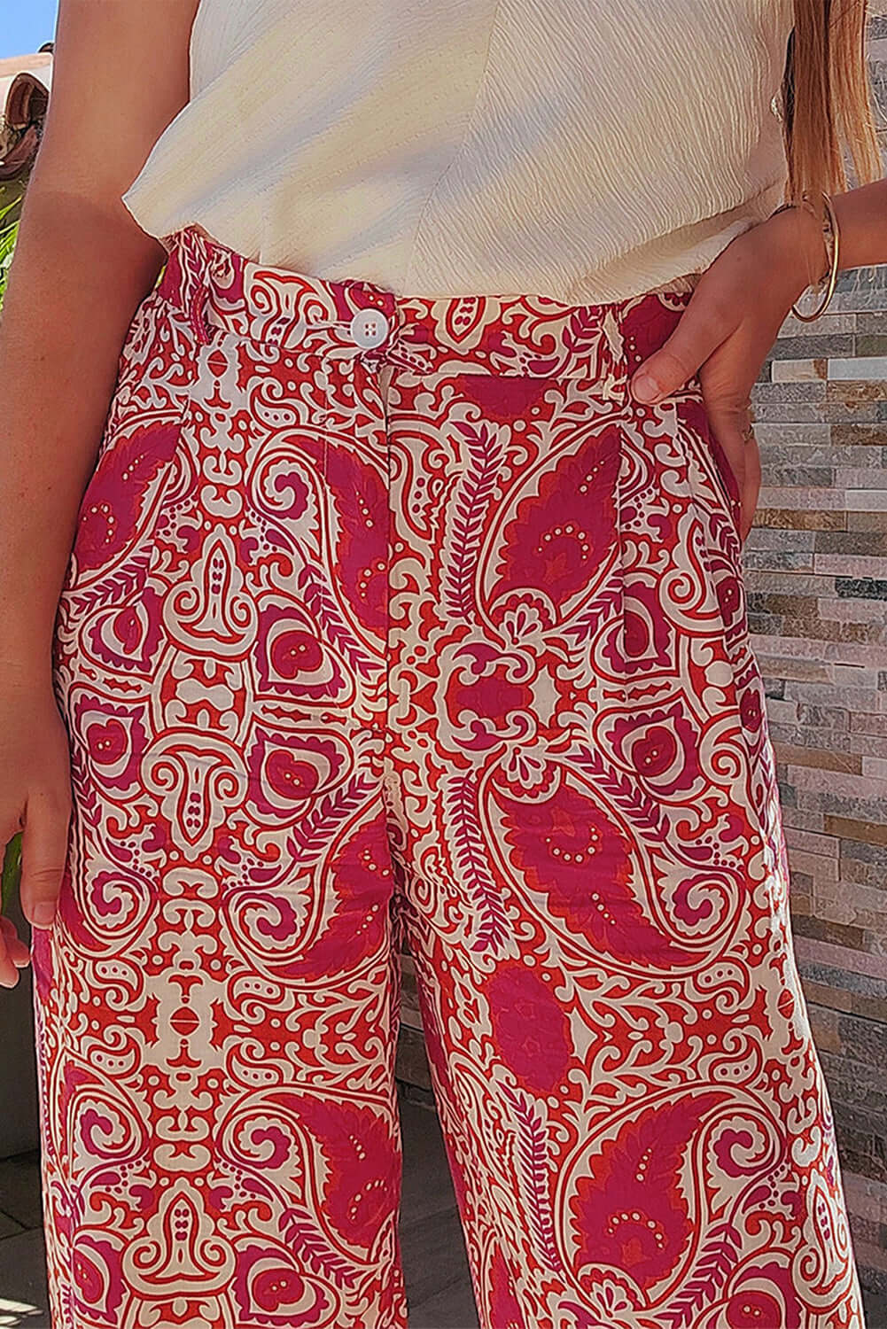 Boho Glam Wide Leg Pants in red and cream abstract motif with high waist and button detailing.