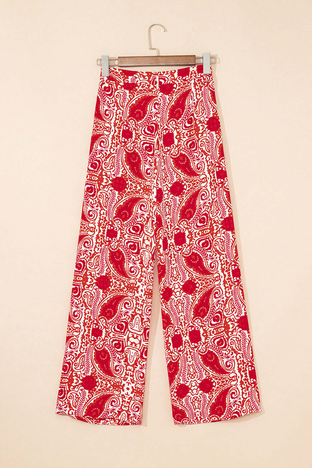 Boho Glam Wide Leg Pants in red and cream abstract paisley pattern, featuring a high waist and wide-leg design.