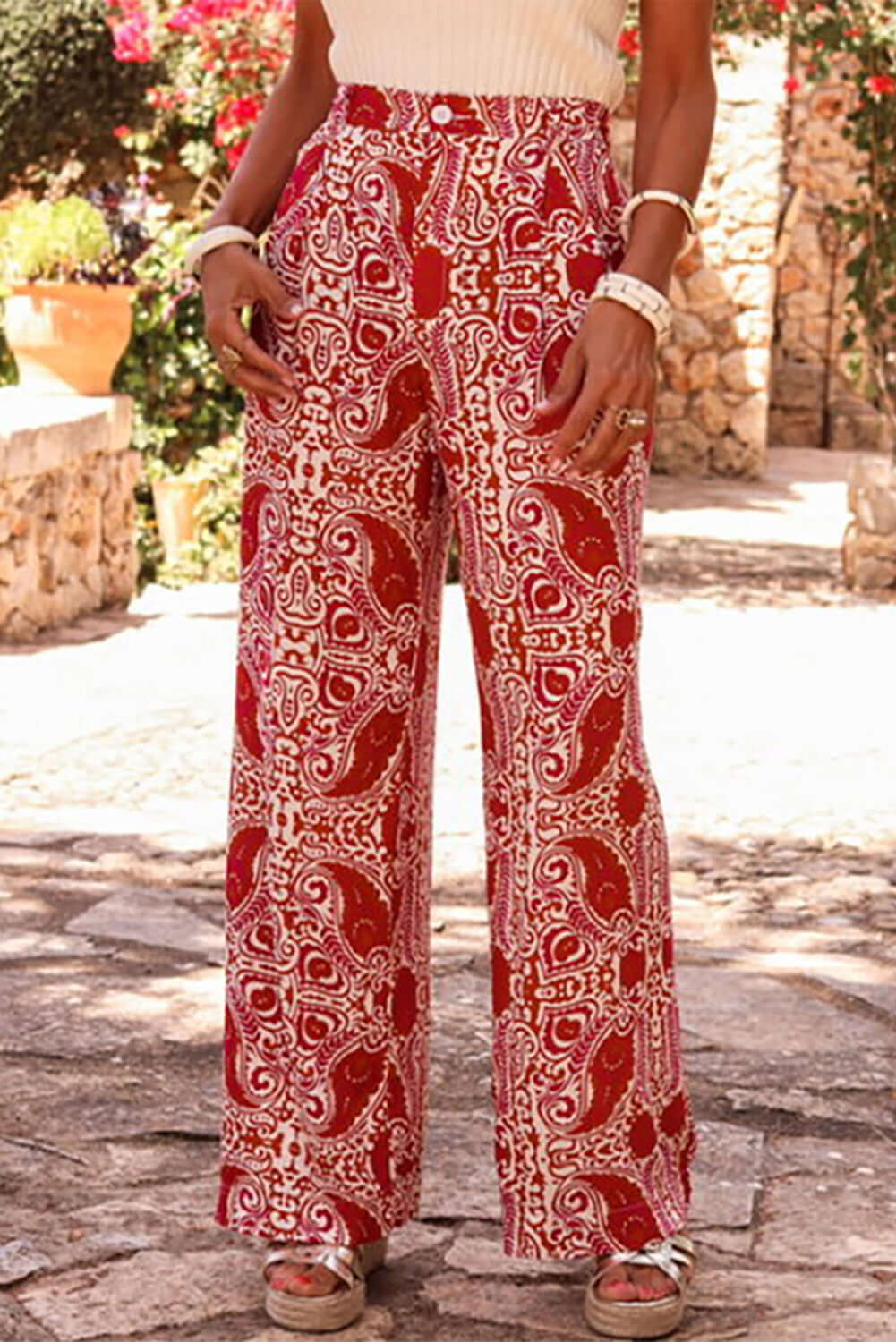 Chic red and cream boho glam wide leg pants with abstract motif and high waist design.
