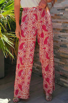 Chic Boho Glam Wide Leg Pants in red and cream abstract motif, high waist design, styled with sandals.