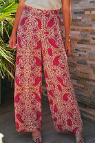 Chic Boho Glam Wide Leg Pants in red and cream with abstract motif, featuring high waist and functional pockets.