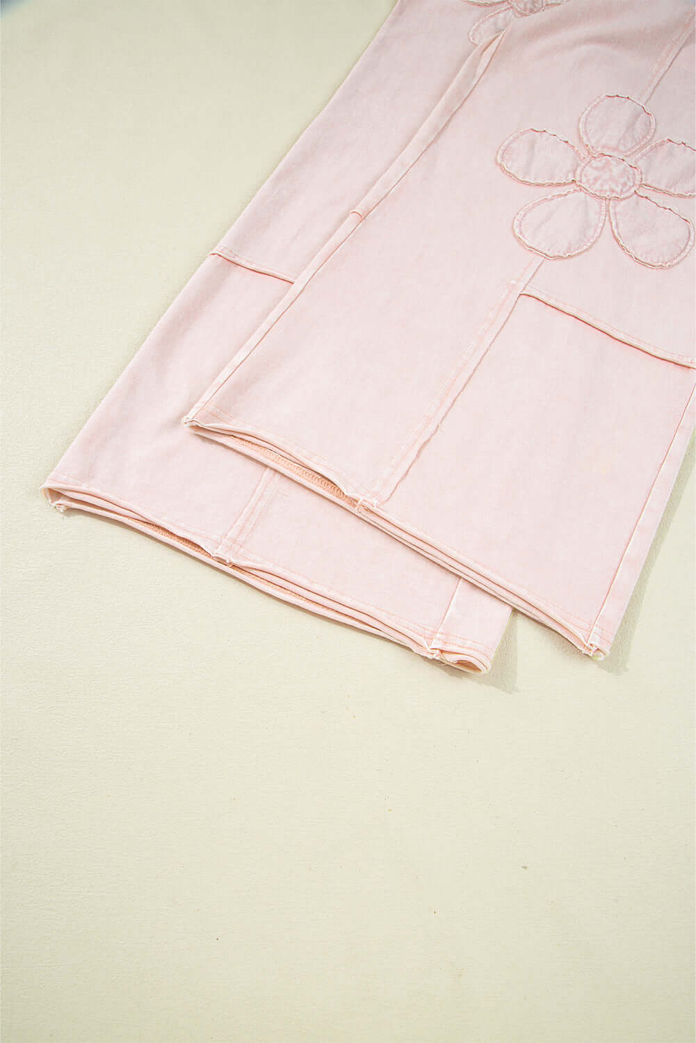 Daisy Daydreamer Pants in soft pink with flower patches, showcasing boho style and comfort.