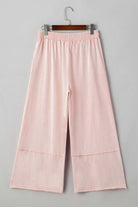 Daisy Daydreamer Pants, pink cropped wide-leg pants with elastic waistband and soft terry knit fabric.